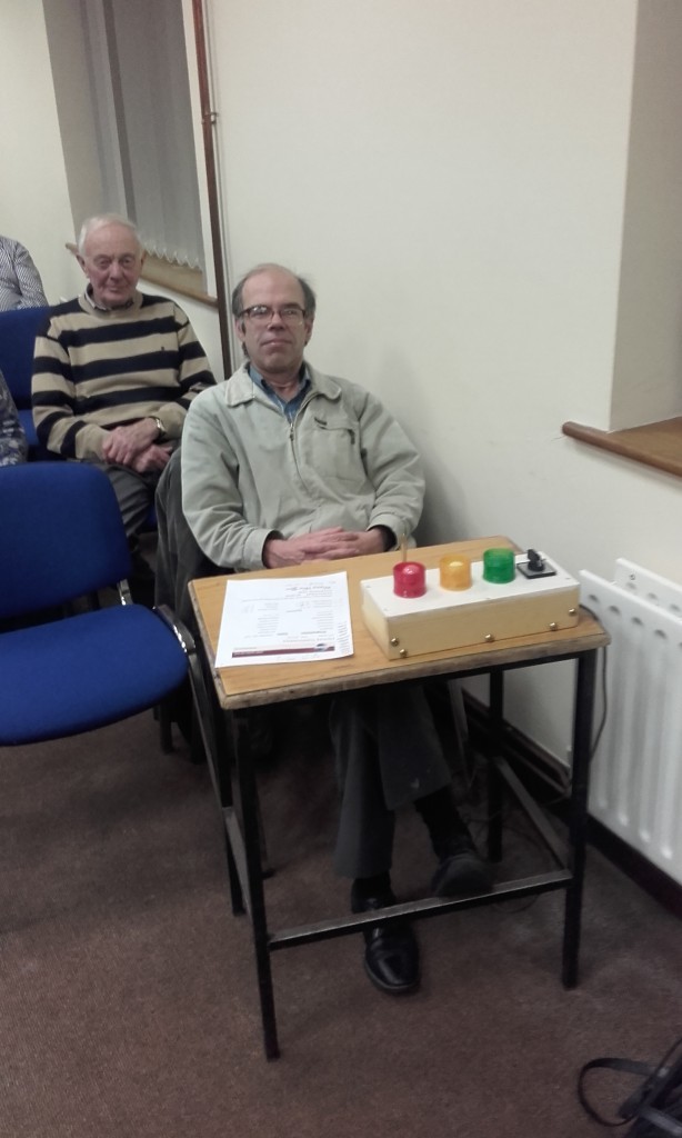  Michael Sheehan takes his place at the lights in his role as timekeeper of the first club meeting of 2016 on January 12th at the Fermoy Youth Centre. Behind him we see John Quirke, the longest serving member of Fermoy Toastmasters since 1978 and boasting one of the very longest periods of uninterrupted membership of Toastmasters in these islands. Michael and John in their long-maintained enthusiasm are two wonderful people and very great friends who bring so much encouragement and inspiration, joy and pleasure to us all. Long may they so continue!
