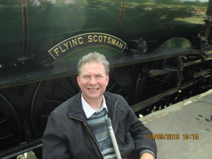  'Kevin Walsh, with The Flying Scotsman at Carlisle, England'. 