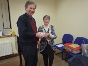  Club President Eilish Ui Bhriain presents First Prize to Kevin Walsh in the Speech Contest.