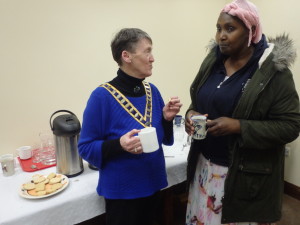  Club President Eilish Ui Bhriain shares a cup of tea and genial chat with our newest member, Angela Negethe, during the tea-break of the club meeting on March 28th 2017. 