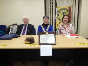  With relaxed warm smiles Club President Eilish Ui Bhrian presides on March 28th 2017, flanked by Topicsmaster Mary Whelan (right) and Toastmaster of the evening, John Kelly.