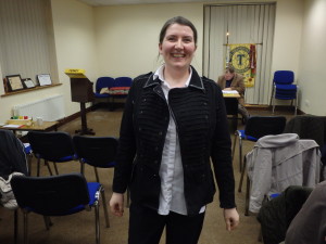 .Patricia O'Connell of Mallow Toastmasters relaxes after giving her comic After Dinner speech to the club meeting on April 11th 2017. The empty seats in the background reveal that all have gone for their trifles and teas, but there was plenty for Patricia and for everyone to enjoy! 